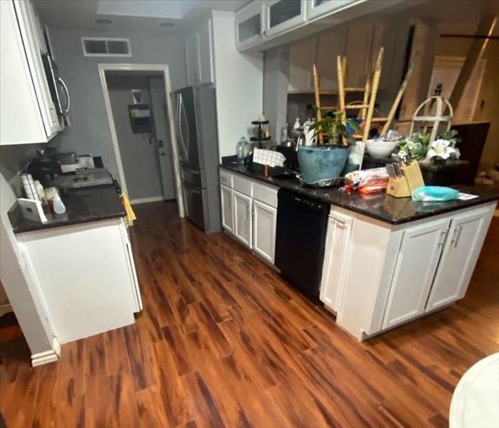 Kitchen with wood flooring