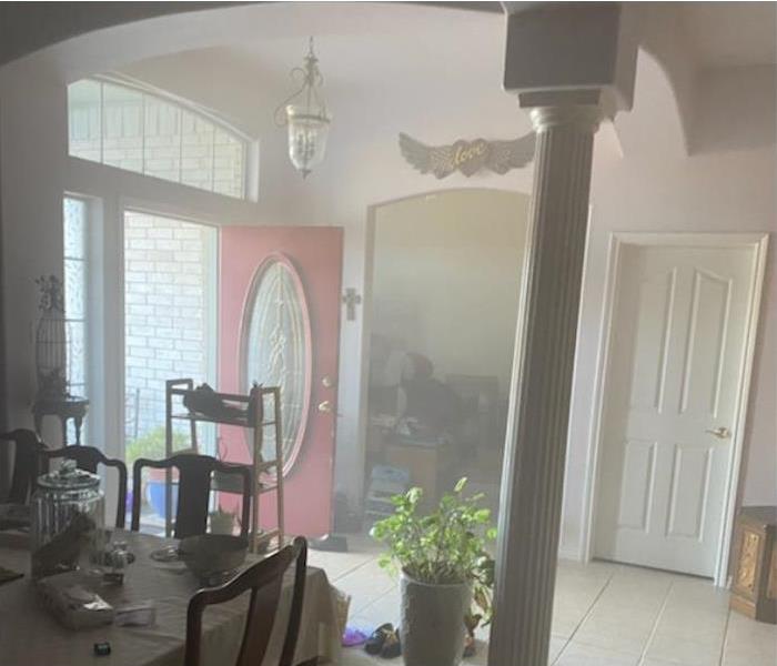 foyer area in home with smoke damage