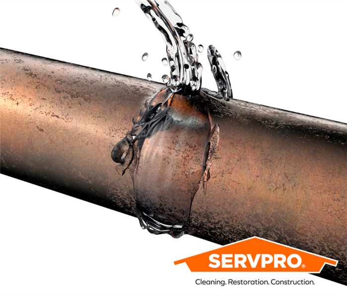 copper pipe bursting with water with SERVPRO logo